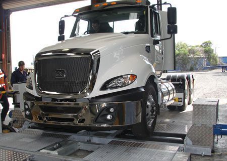 Roller brake tester with truck